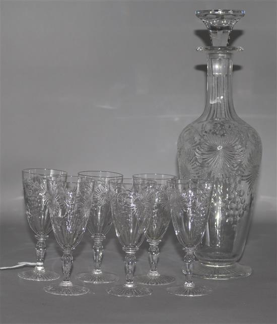 A rock crystal decanter and six glasses